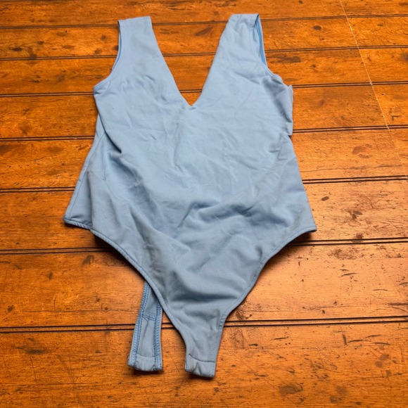 Free People Tops - Free People Light Blue V Neck Thong Bodysuit Snap Closure Women's Size medium